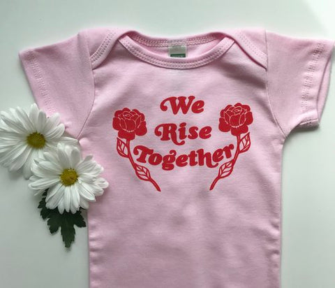 We Rise Together Baby Onesie/Pink